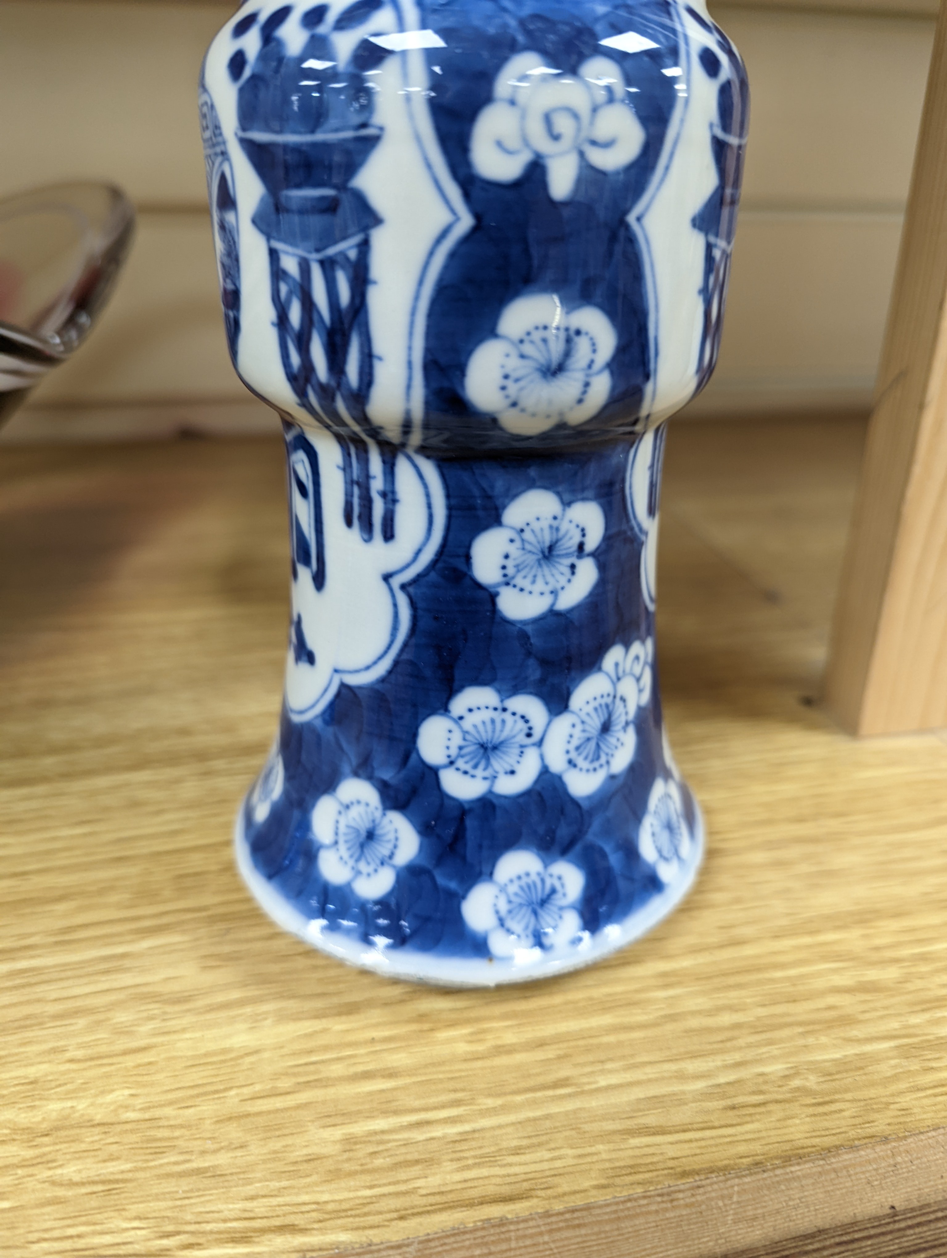 A 19th century Chinese blue and white prunus gu vase, 25 cms high.